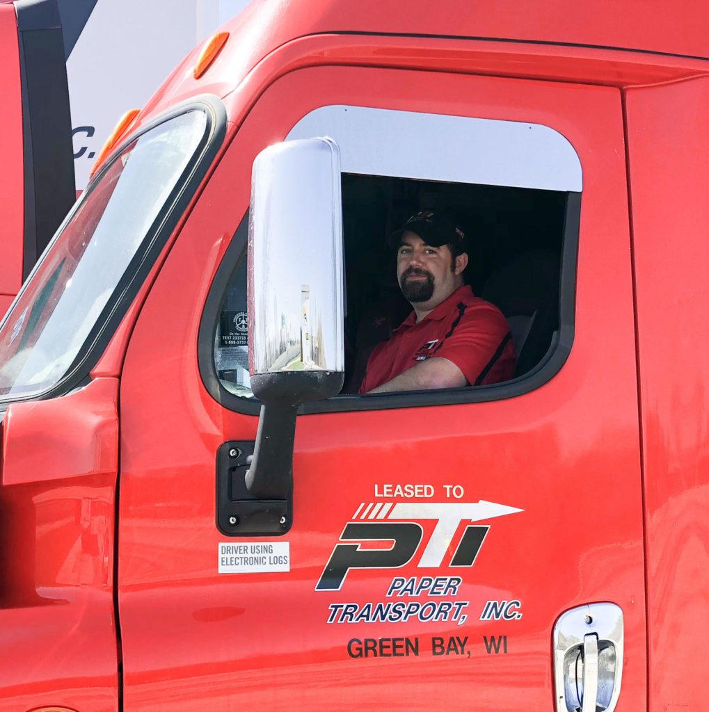 Owner-Op-Photo-1 PTI Owner Operator in Truck Cab - Paper Transport, Inc.